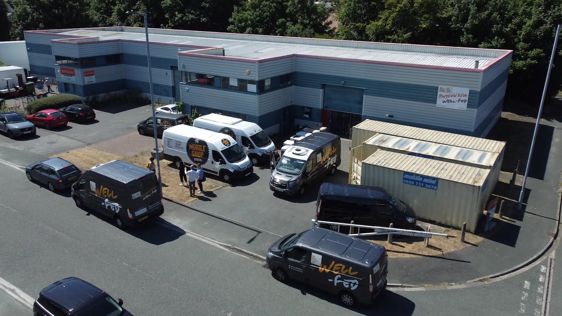 Well-Fed mobile shop vans outside a community food hub